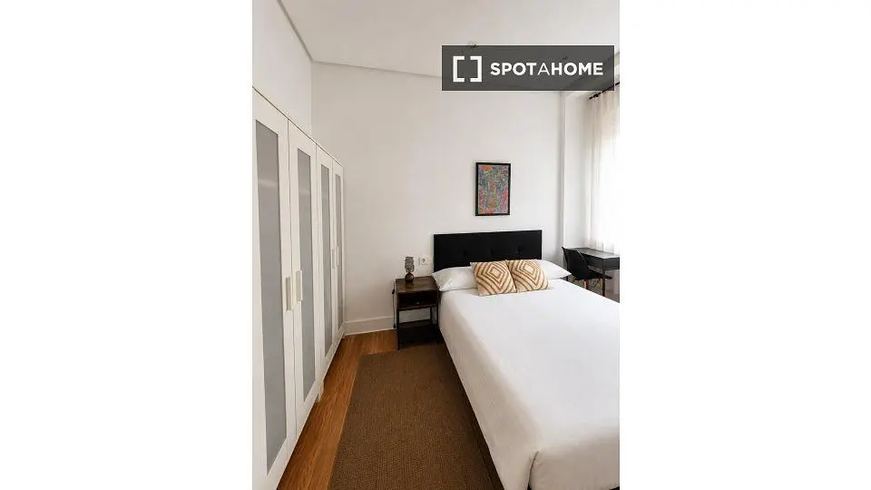 Bedroom; wood floor, natural light