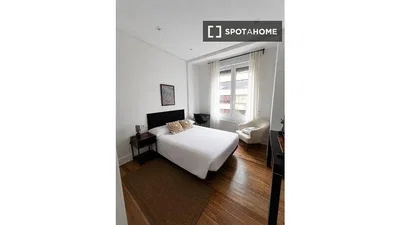 Bedroom; wood floor, natural light