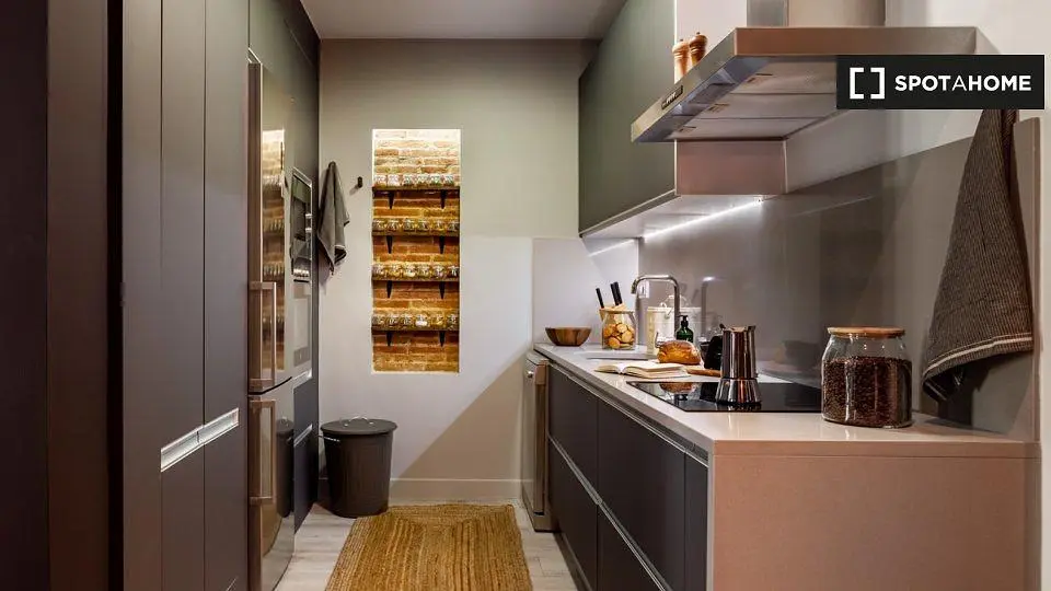 Kitchen; kitchen appliances, wood floor, natural light