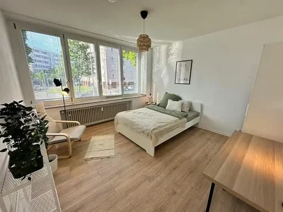 Bedroom; natural light, wood floor