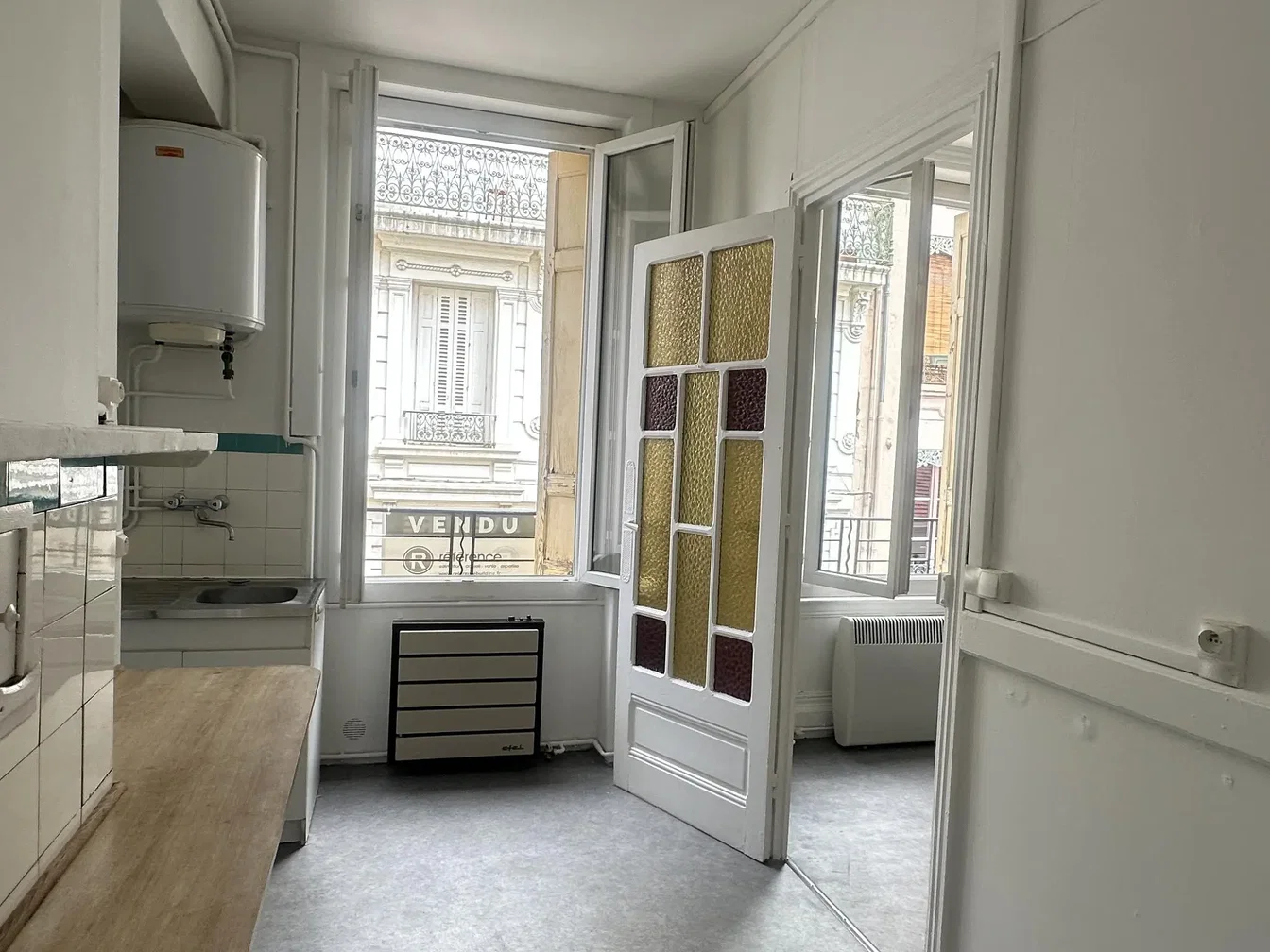 Kitchen; natural light, needs renovation