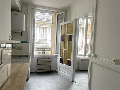 Kitchen; natural light, needs renovation