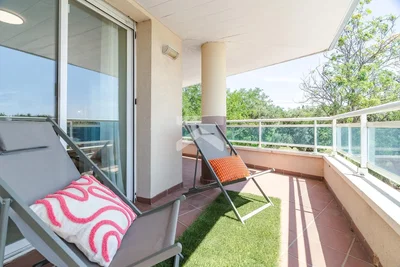 Balcony; natural light, tile floor