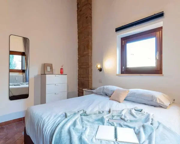 Bedroom; natural light, tile floor