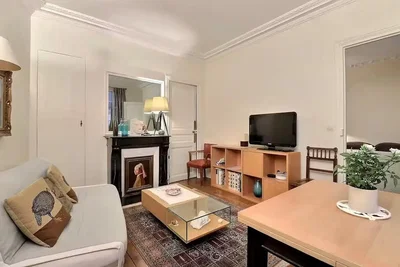 Living room; wood floor, fireplace, natural light