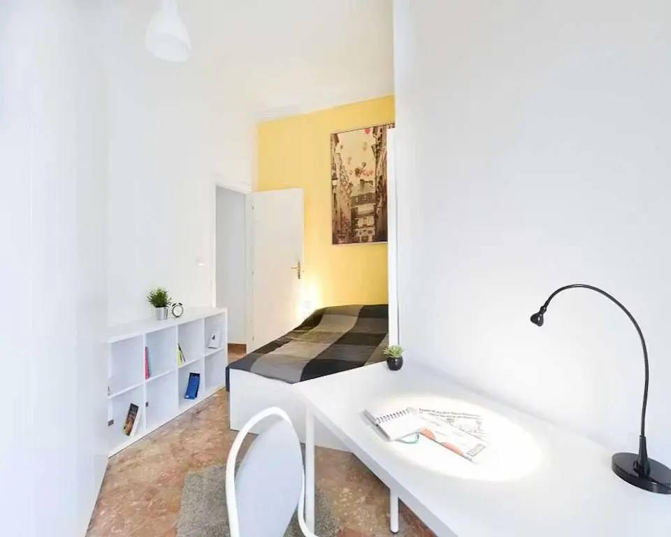 Bedroom; natural light, wood floor