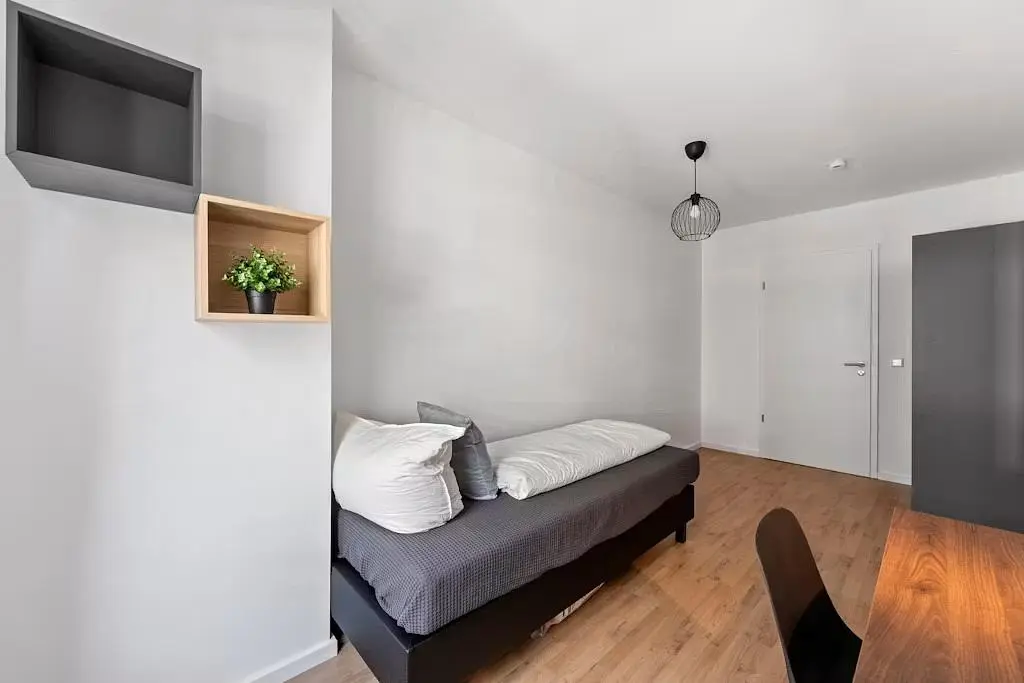 Bedroom; wood floor, natural light