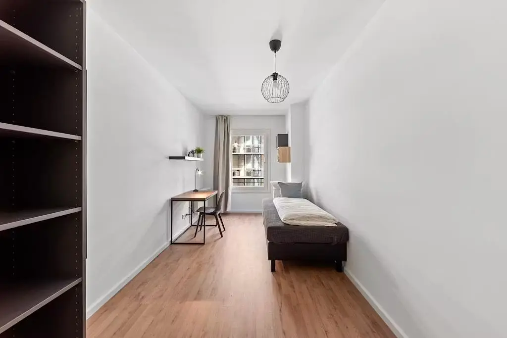 Bedroom; wood floor, natural light