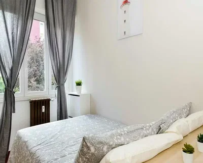 Camera da letto; luce naturale, stile moderno