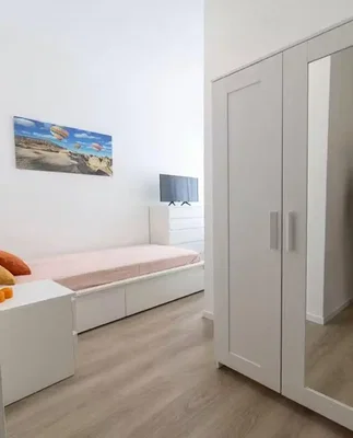 Bedroom; wood floor, natural light, modern style
