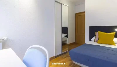 Bedroom; wood floor, natural light