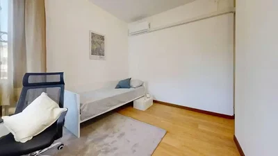 Camera da letto; pavimento in legno, luce naturale