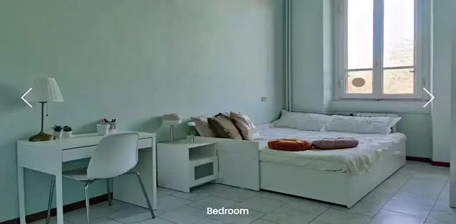 Dormitorio; luz natural, suelo de baldosas