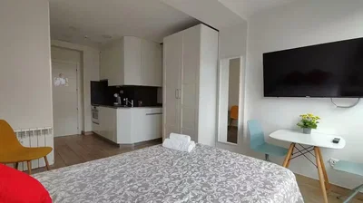 Bedroom; kitchen appliances, natural light, modern style