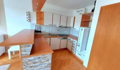 Kitchen; kitchen appliances, wood floor, natural light