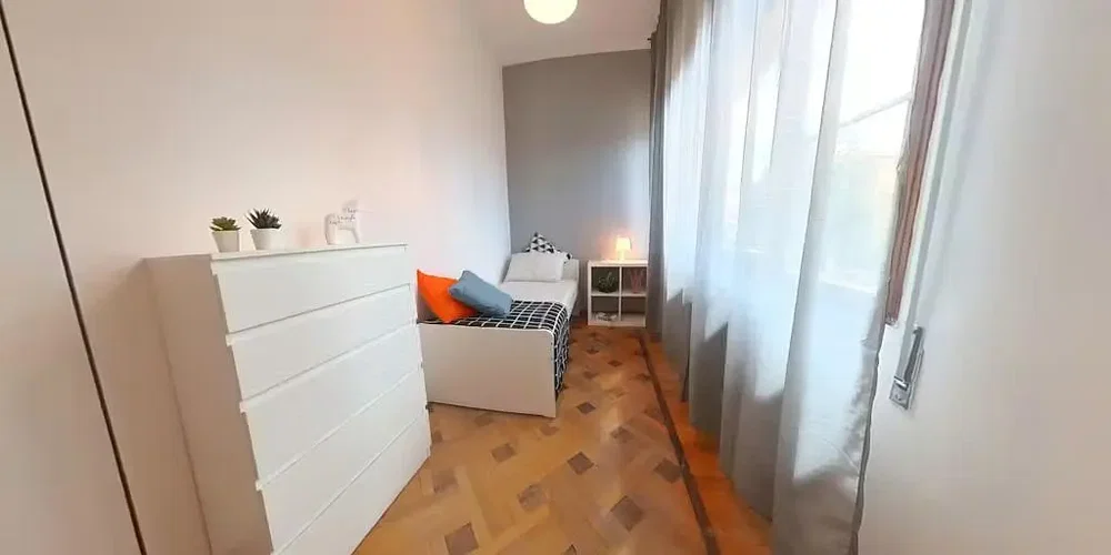 Bedroom; natural light, wood floor