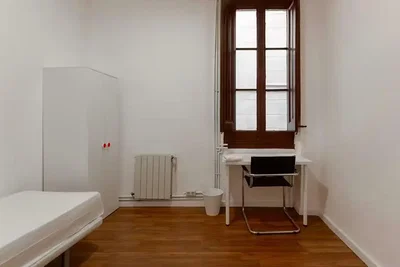 Bedroom; wood floor, natural light