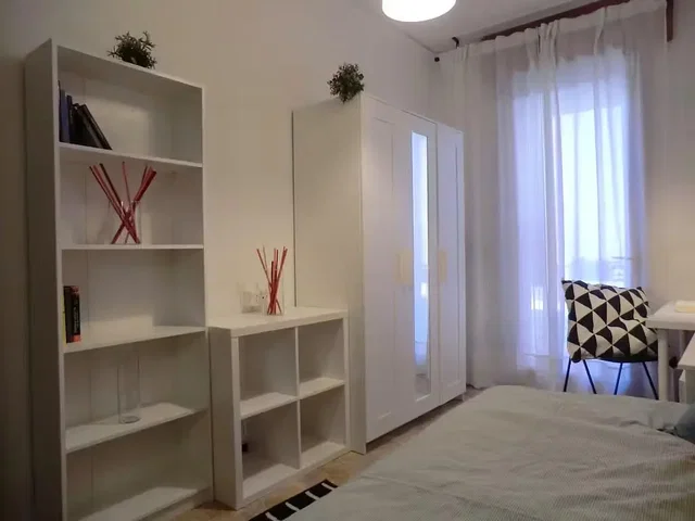 Slaapkamer; natuurlijk licht, houten vloer
