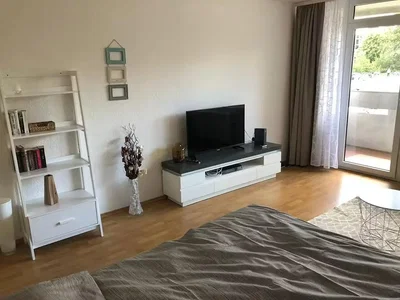 Bedroom; natural light, wood floor