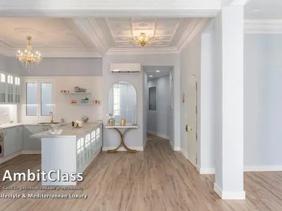Kitchen; kitchen appliances, wood floor, natural light, modern style, renovated