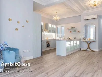 Kitchen; kitchen appliances, wood floor, renovated, natural light, modern style
