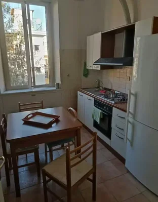 Kitchen; tile floor, kitchen appliances, natural light, view
