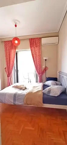 Bedroom; wood floor, natural light