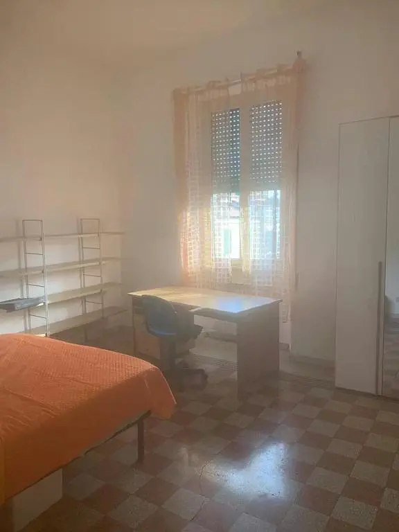 Bedroom; tile floor, natural light