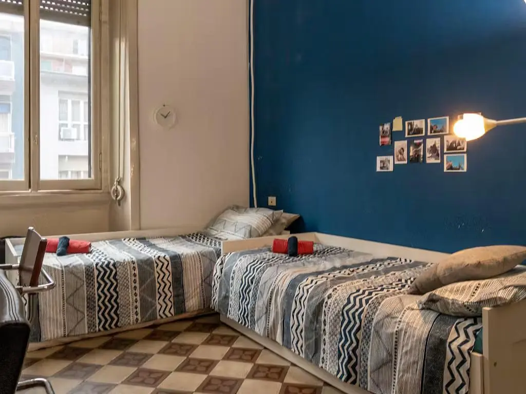 Bedroom; tile floor, natural light