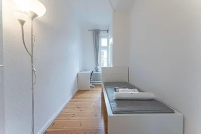 Bedroom; wood floor, natural light