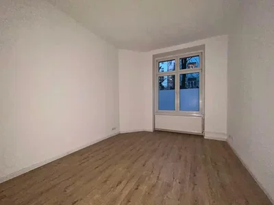 Bedroom; wood floor, natural light