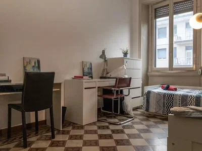 Bedroom; tile floor, natural light