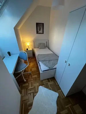Bedroom; wood floor, natural light