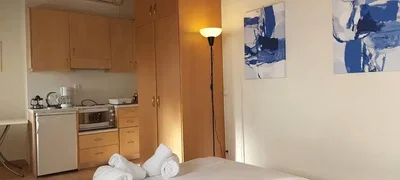 Bedroom; kitchen appliances, natural light