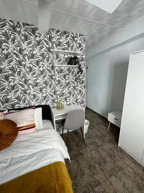 Bedroom; tile floor, natural light