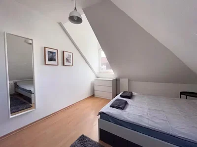 Bedroom; natural light, wood floor