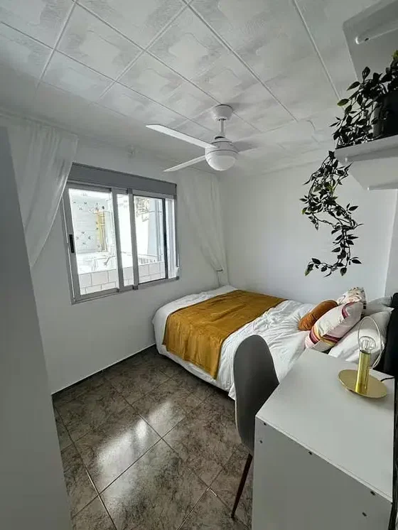 Bedroom; tile floor, natural light