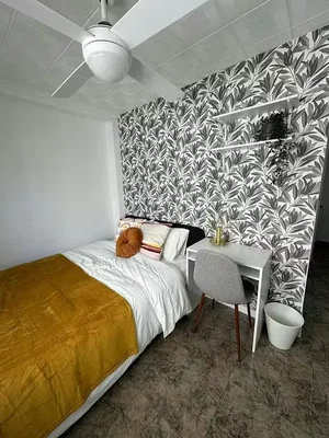 Bedroom; tile floor, natural light