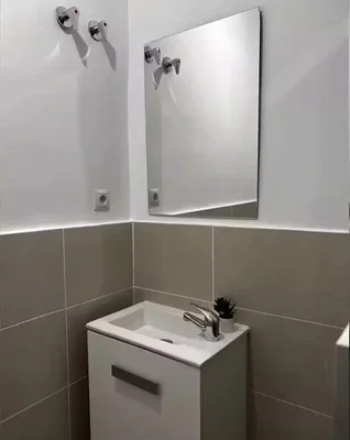 Toilet; tile floor, renovated, natural light