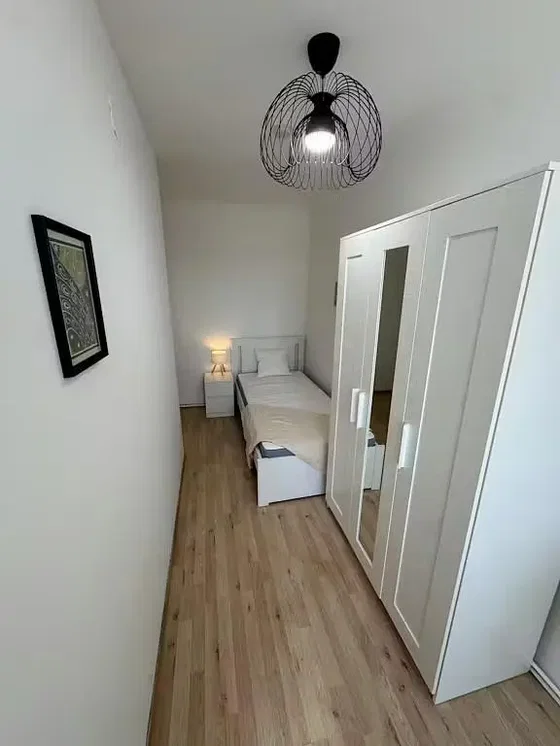 Bedroom; wood floor, natural light