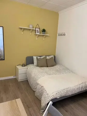 Bedroom; wood floor, natural light