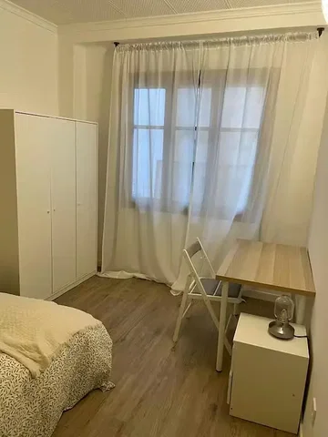 Bedroom; wood floor, natural light
