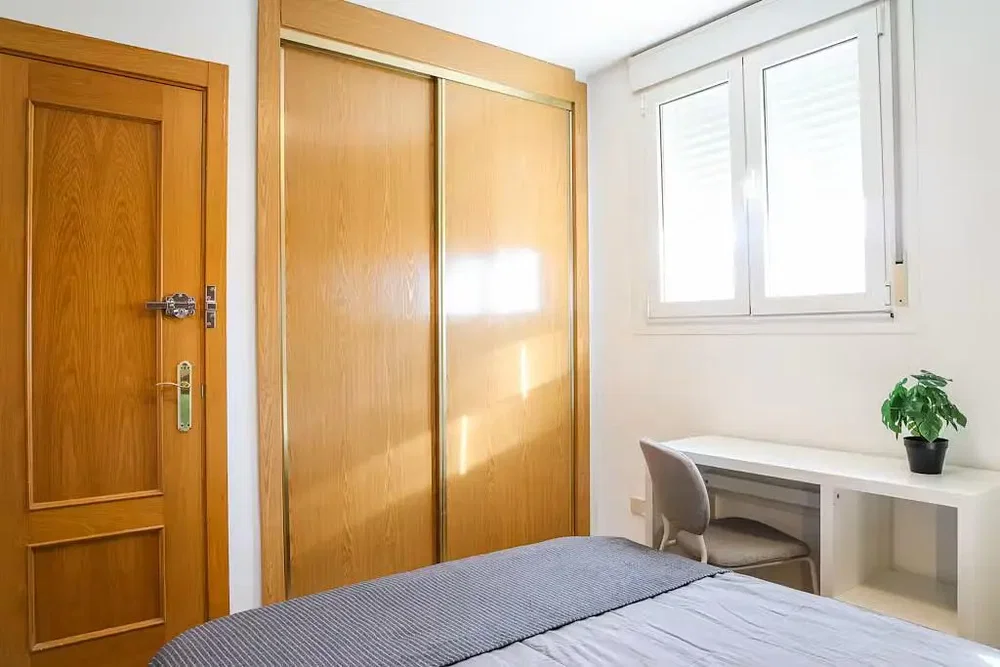 Bedroom; natural light, wood floor