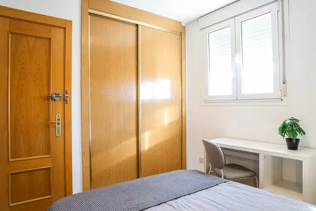Bedroom; natural light, wood floor