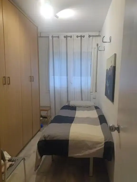Bedroom; wood floor, natural light