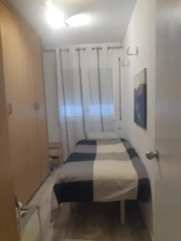 Bedroom; natural light, wood floor