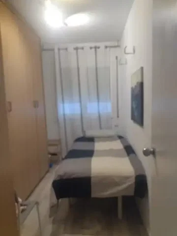 Bedroom; natural light, wood floor