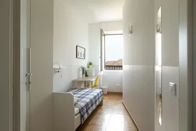 Camera da letto; luce naturale, pavimento in legno