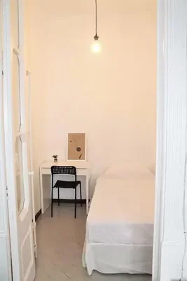 Bedroom; natural light, tile floor