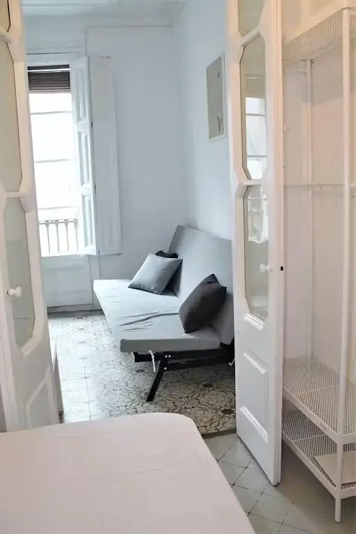 Bedroom; natural light, tile floor